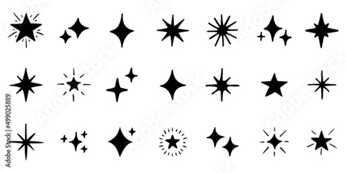 Set of hand drawn sparkles symbols isolated on white background. doodle vector illustration.