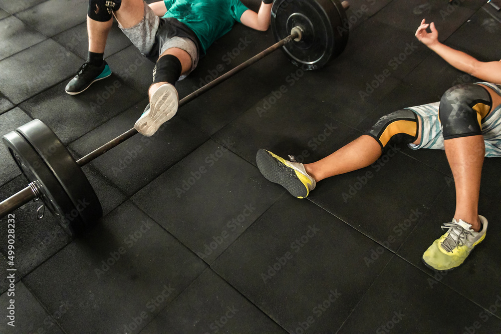 athlete training in the gym crossfit weights and body weight Stock