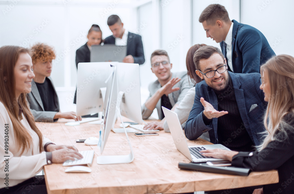 business colleagues discussing work issues in the workplace. business colleagues discussing work issues in the workplace.