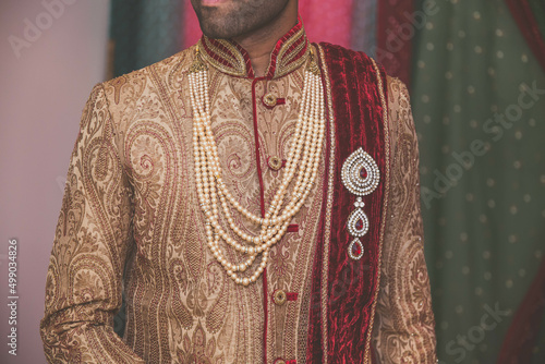 Indian Hindu groom's wedding outfit close up © Stella Kou