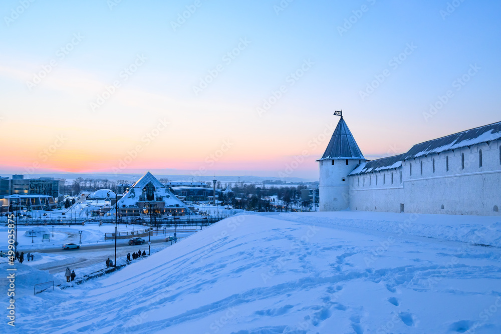 Winter city landscape, ancient fortress wall