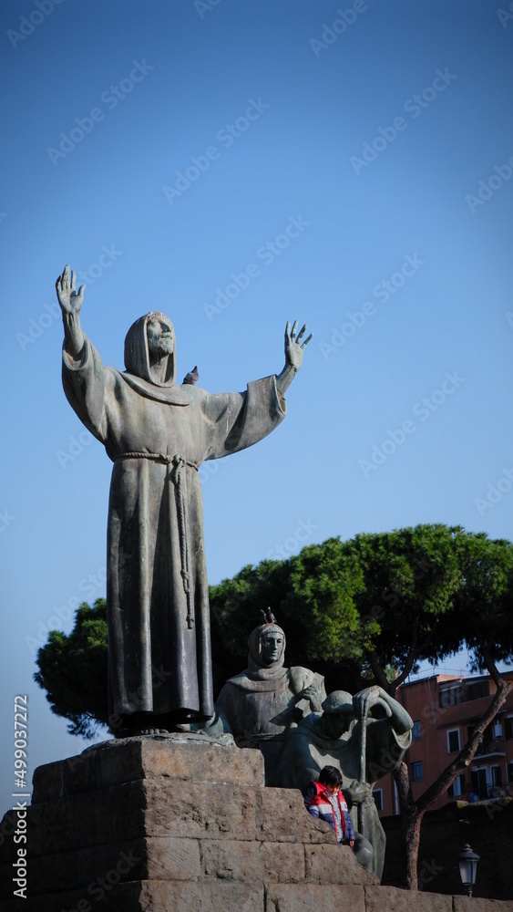 Statue of Saint Francis in St. John Lateran square of Rome