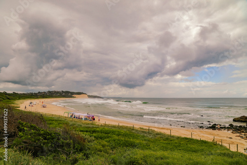 People enjoying a day at One Mile Beach in Forster, NSW Australia © Caseyjadew