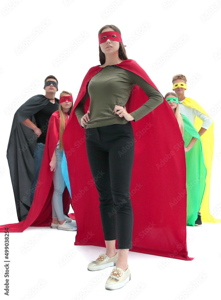 confident young woman in a red cloak of a superhero