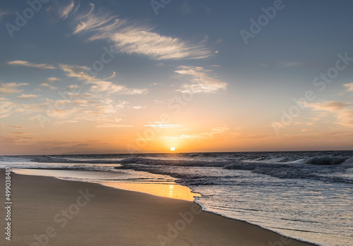 Deserted Hawaiian beach sunset in Kauai 