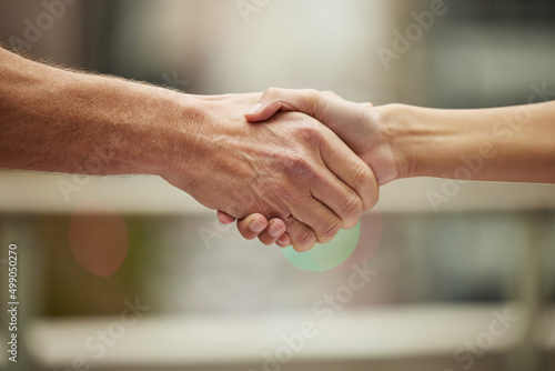 Its great to meet you. Closeup shot of two unrecognisable people shaking hands. © David L/peopleimages.com