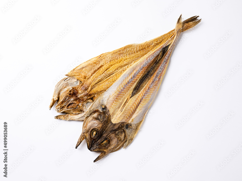 Dried pollack on a white background viewed from above