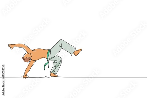 One continuous line drawing young sporty Brazilian fighter man training capoeira on the beach. Healthy traditional fighting sport concept. Dynamic single line draw design graphic vector illustration