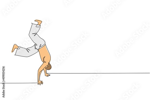 Single continuous line drawing of young sportive man practice Brazilian capoeira move dance at outdoor street. Culture martial art and sport concept. Trendy one line draw design vector illustration