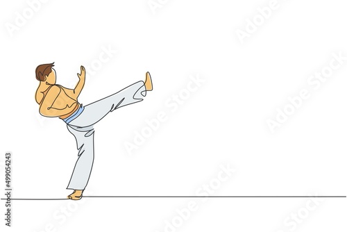 One continuous line drawing young sporty Brazilian fighter man training capoeira on the beach. Healthy traditional fighting sport concept. Dynamic single line draw graphic design vector illustration