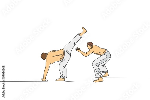 One continuous line drawing of two young sporty Brazilian fighter men training capoeira on the beach. Healthy traditional fighting sport concept. Dynamic single line draw design vector illustration