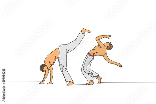 One single line drawing of two young energetic man capoeira dancers perform dancing fight vector illustration. Traditional martial art lifestyle sport concept. Modern continuous line draw design