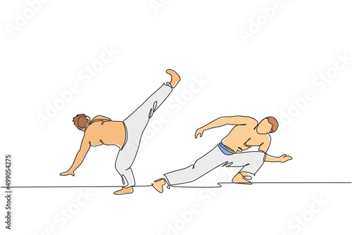 One continuous line drawing of two young sporty Brazilian fighter men training capoeira on the beach. Healthy traditional fighting sport concept. Dynamic single line draw design vector illustration