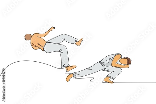 One continuous line drawing of two young sporty Brazilian fighters men training capoeira on the beach. Healthy traditional fighting sport concept. Dynamic single line draw design vector illustration