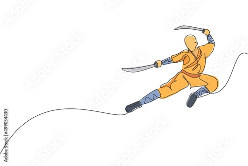 Photo Single continuous line drawing of young muscular shaolin monk man holding sword and train jumping kick at temple