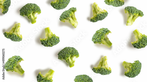 Seamless pattern with fresh broccoli on white background.