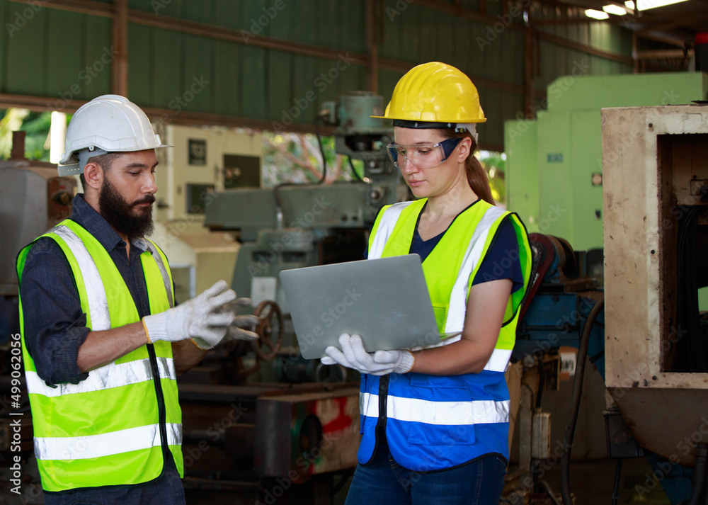 A team of professional male and female engineers with quality skills, inspecting, controlling, and maintaining machines A team of professional male and female engineers with quality skills, inspecting, controlling, and maintaining machines