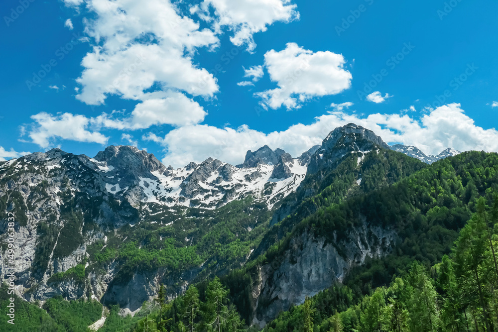 Scenic view on the rocky sharp summits in Kamnik Savinja Alps in Carinthia, border Austria and Slovenia. Mountain peaks in the Vellacher Kotschna in spring. Mountaineering. Freedom. Jezerska Kocna