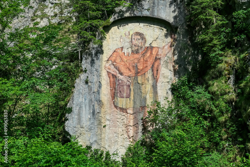 Bild auf Leinwand Painting of Saint Christopher and baby Jesus on a rock in Bad Vellach near Bad Eisenkappel, Carinthia, Austria