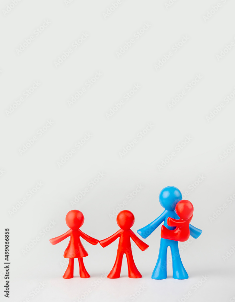 Multicolored men on a gray background. Father and children concept, father's day Multicolored men on a gray background. Father and children concept, father's day