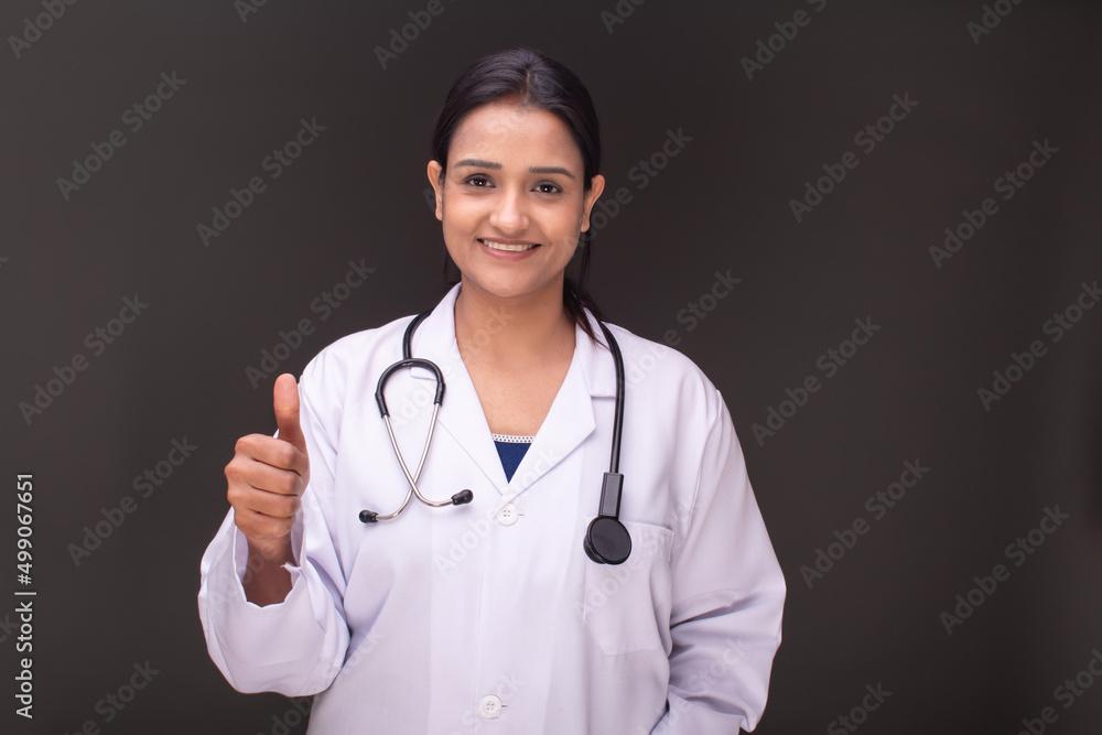 Young doctor woman over isolated background Young doctor woman over isolated background
