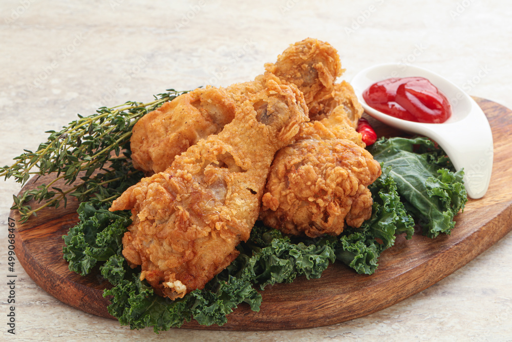 Fried chicken drumsticks with tomato sauce Fried chicken drumsticks with tomato sauce