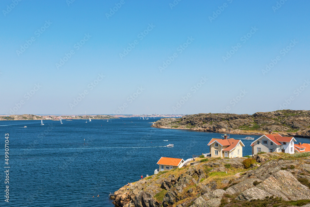 View of the sea archipelago with cottages on a cliff at the Swedish west coast