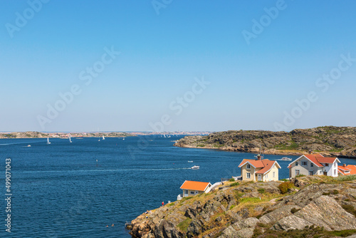 View of the sea archipelago with cottages on a cliff at the Swedish west coast