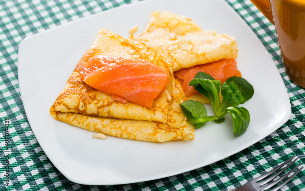 Delicious homemade crepes served with smoked salmon