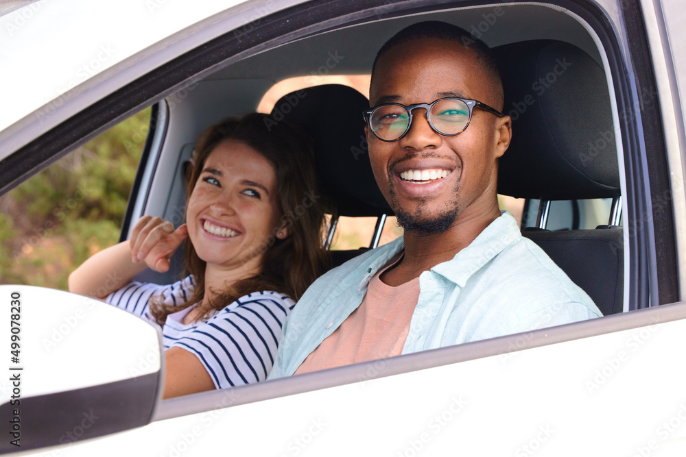 Whats a roadtrip without my number one. Shot of a happy young couple going on a road trip. Whats a roadtrip without my number one. Shot of a happy young couple going on a road trip.