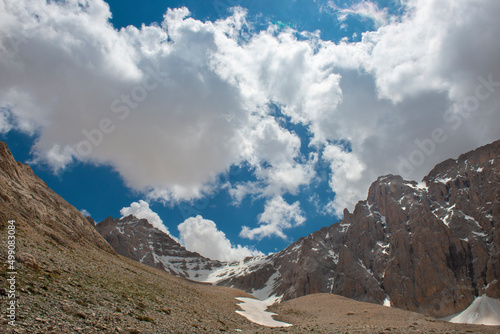 Aladaglar National Park (glacial landscape). Cloudy mountain landscape. Glacial mountains, hills. Trans mountain hikes. Aladaglar trekking. Melting glacial waters. Trans transitions. Nigde, Turkey.