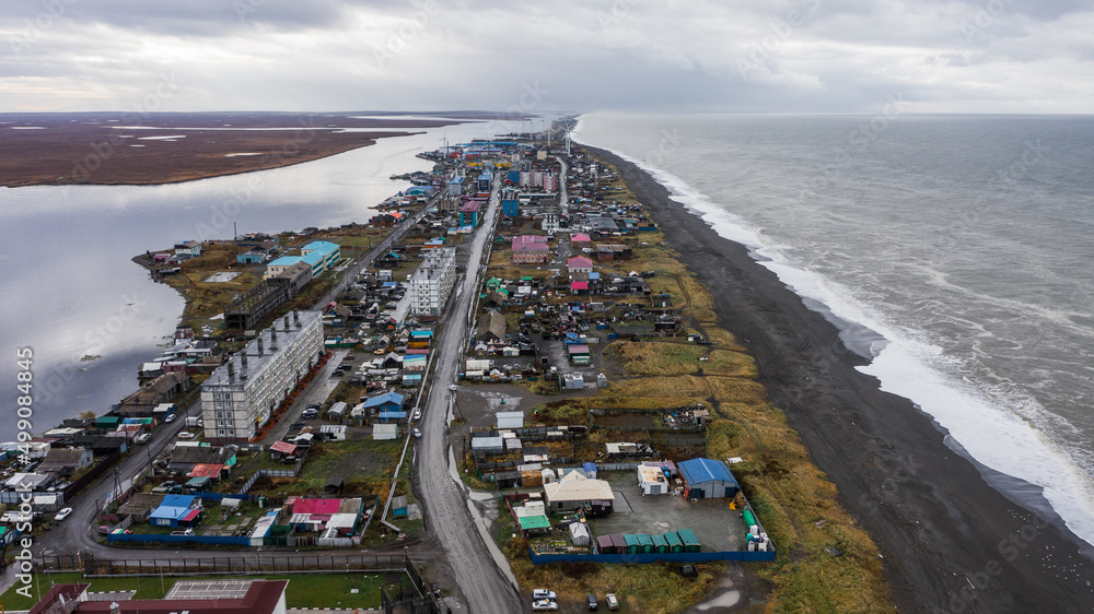 Naklejka premium village of Oktyabrsky Kamchatka. Windmills, town on Sandbar