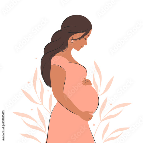 Obraz na płótnie Pregnant woman with dark hair, future mom hugging belly with arms