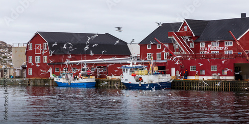 Vagan Norway 02-28-2022. Fishing boats and  fisherman's house  called Rorbu at Vagan in Lofoten islands. Norway. photo