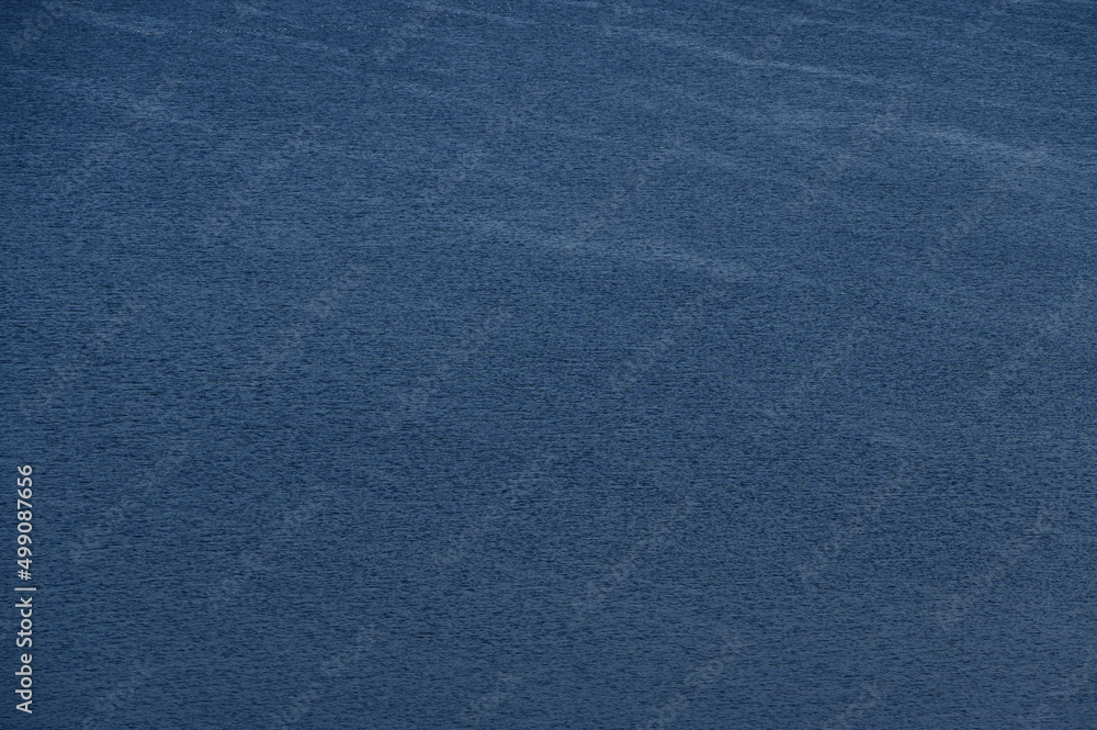 Water surface ripples, waves. Abstract image, wind ripples in water. Beautiful image. Background, textures. Meditation, concentration, peace. Shape of water, movement, from above.