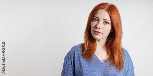 mid adult woman with a curious inquisitive expression photo