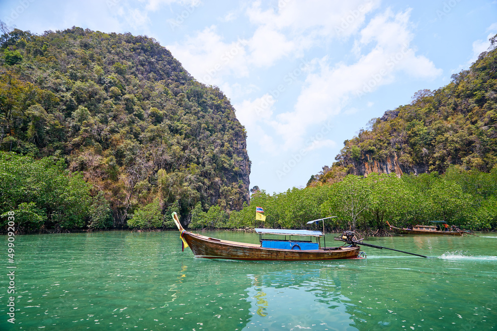 Vacation on island. Beautiful landscape with sea, boat and rocks.