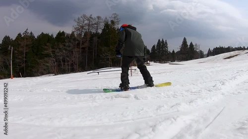 POV point of view snowboarder on ski slope downhill park riding extreme sports Hakuba Goryu Japan Asia tourism travel HD photo