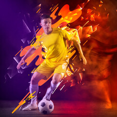 Creative artwork with soccer, football player in motion and action with ball isolated on dark background with polygonal and fluid neon elements. Art, creativity, sport