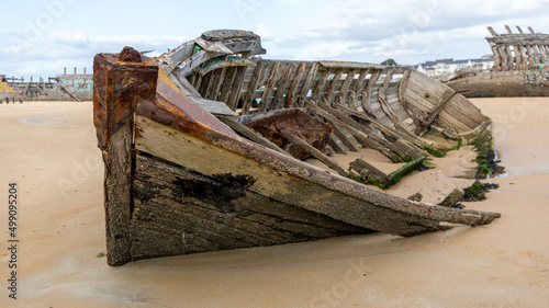 Carcass of boats in a boat cemetery in Brittany in France in February 2022