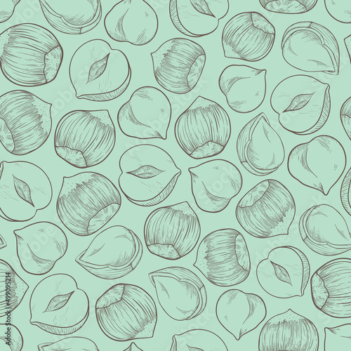 Seamless hazelnut pattern with several fruit nuts and kernels in sketch style. Turquoise background for packing hazelnut or chocolate, nut paste