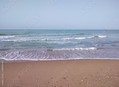 The waves of the sea on the shore of Agrigento beach