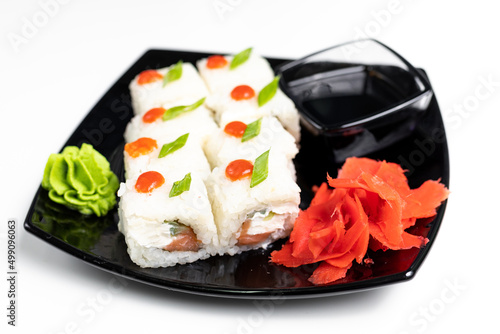 rolls, black plate, white background