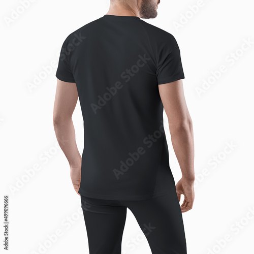 Mockup of a set of sportswear men's pants and t-shirt. Black template on a man isolated on background.