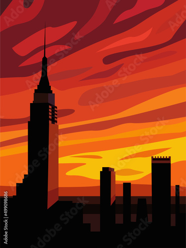 Urban cityscape with silhouettes of buildings against the backdrop of sunset.
