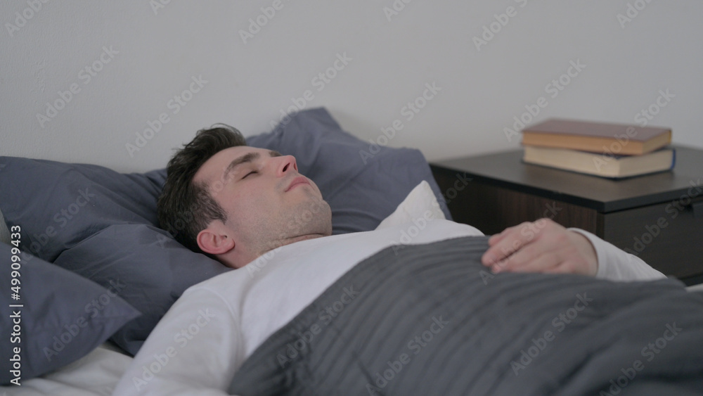 Man Sleeping in Bed Peacefully Man Sleeping in Bed Peacefully
