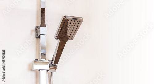 Wallpaper Mural chrome-plated rain shower close-up hanging on wall, copy paste space for design Torontodigital.ca