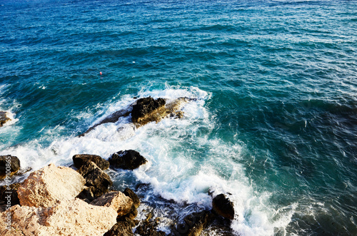 waves crashing on rocks