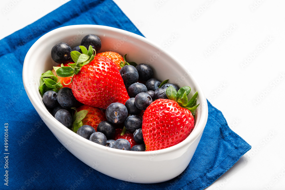 bowl of strawberries and blueberries for 4th July table American independence commemorative dish bowl of strawberries and blueberries for 4th July table American independence commemorative dish
