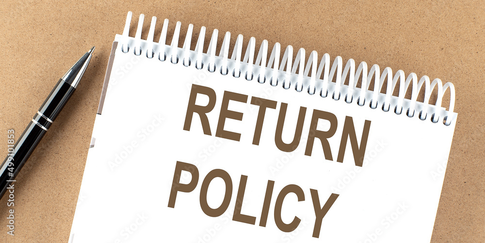 RETURN POLICY text on a notepad with pen, business concept RETURN POLICY text on a notepad with pen, business concept